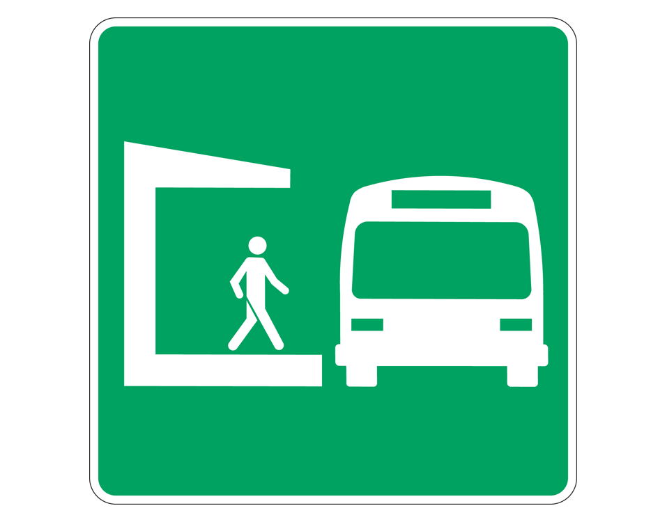 in white on green background: person standing on platform beside front of bus