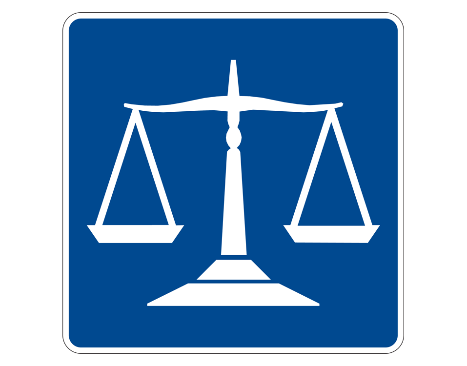 white scale of justice on blue background