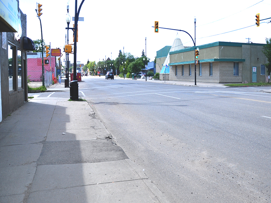 20th Street west street before construction. Image highlights poor state of the public realm.