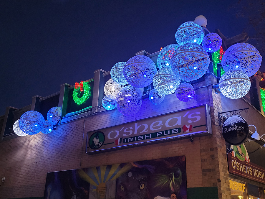 Opportunity Response Program. Example project featuring decorative orb lighting attached to Oshea's pub in the downtown area.